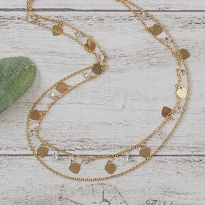 Gold Layered Necklace with Dainty Design